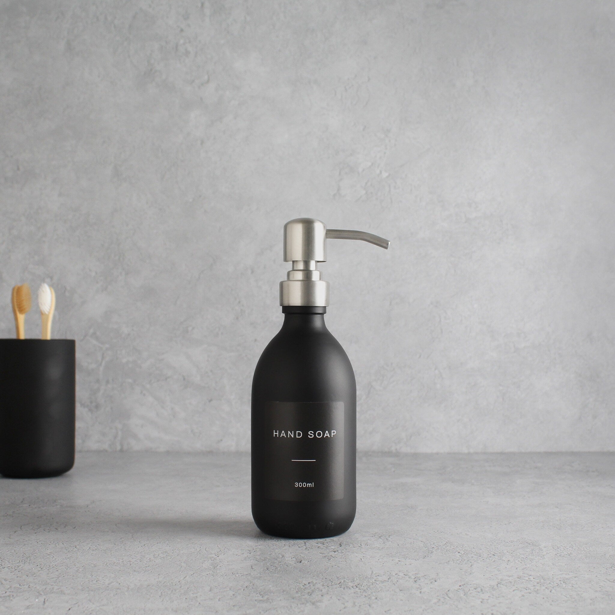 Labelled Matte Black Glass Dispenser Bottle With Silver Pump - Namie Home